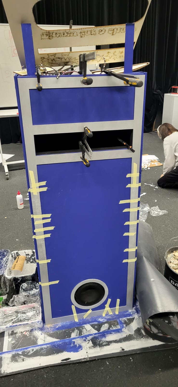 Checking clearances for the blue crate and electronics shelf