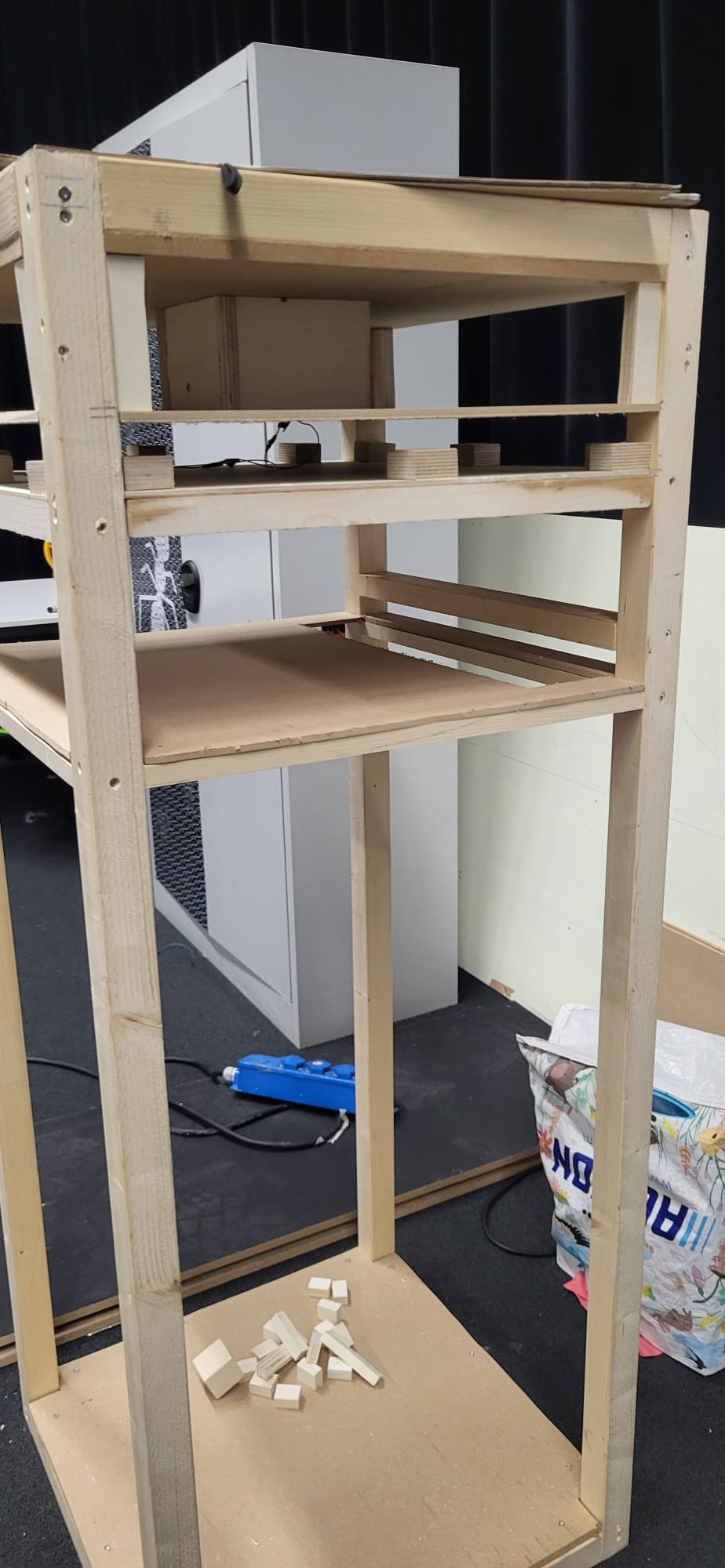 Shelves and chute mocked up inside the bin